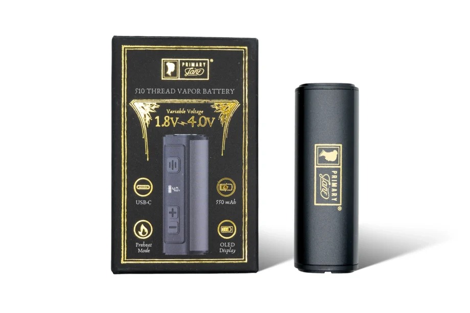 A premium 510 thread battery next to a vape cartridge, showcasing the best 510 thread batteries for 5-MeO-DMT carts in Toronto.