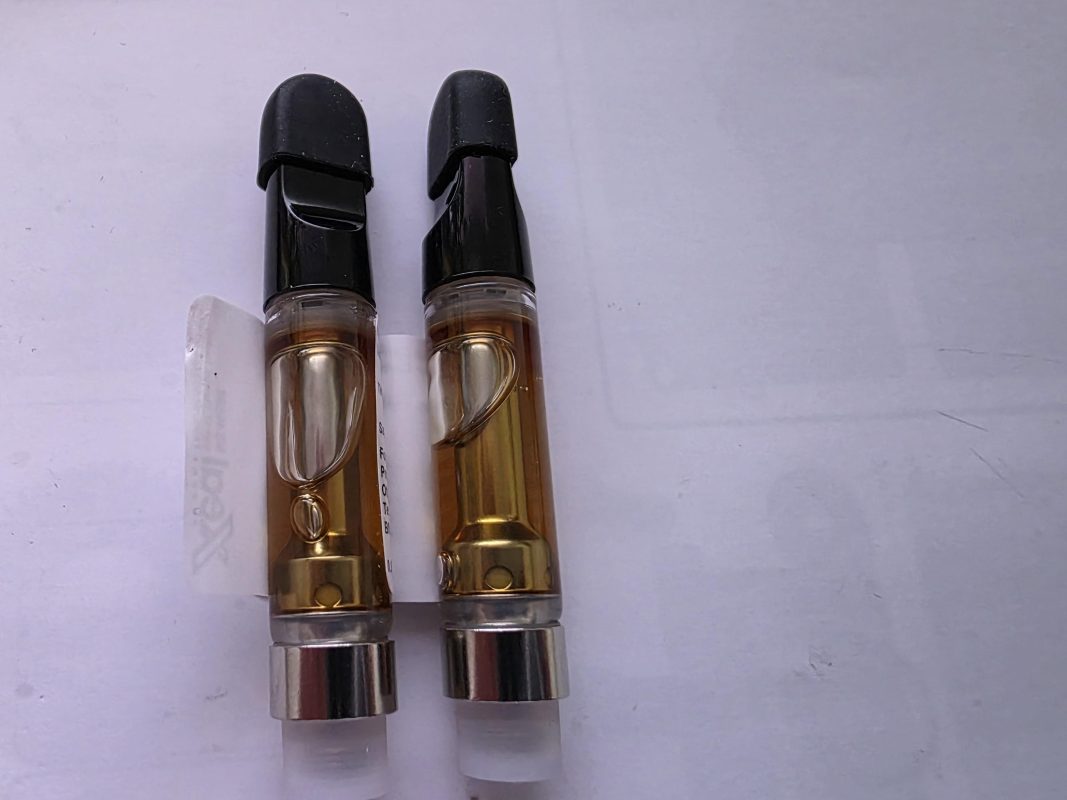 A premium 5-MeO-DMT vape pen resting on a dark surface, representing the ultimate guide to safely ordering vaporizers in Toronto.